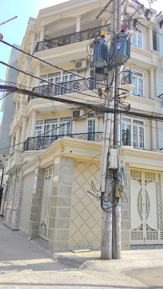 Nhà 1 trệt, 3 lầu mặt tiền hẻm xe hơi đường Lâm Văn Bền, F. Tân Quy, Quận 7, DT: 7.1x14m, T-N